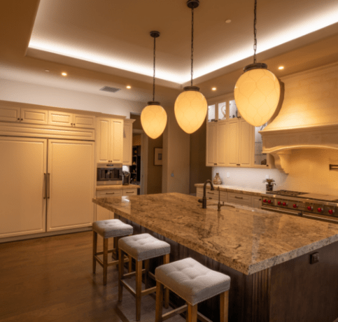 A kitchen with various smart lighting.